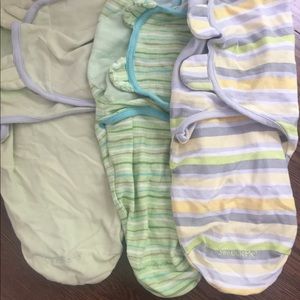 3 SwaddleMe Velcro swaddles.